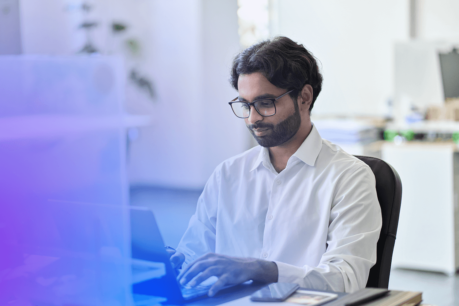 Man typing on laptop Man typing on laptop
